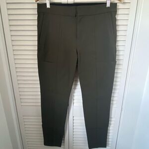 Athleta Wander Stash Skinny Pants in dark green, size 10